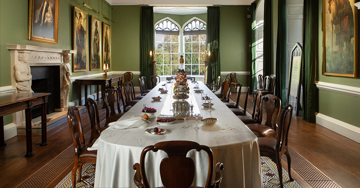 Auckland Castle dining room with paintings on wall and large table